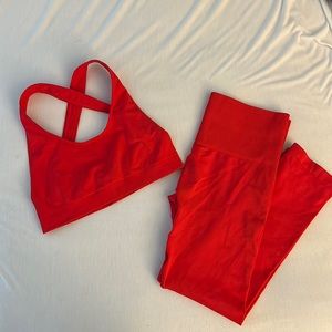 TLA by Morgan Stewart workout set in red. Sports bra size S/M, pants size L